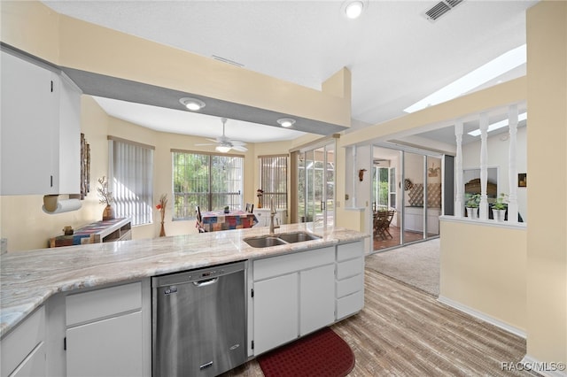 kitchen with ceiling fan, sink, stainless steel dishwasher, light hardwood / wood-style floors, and white cabinets