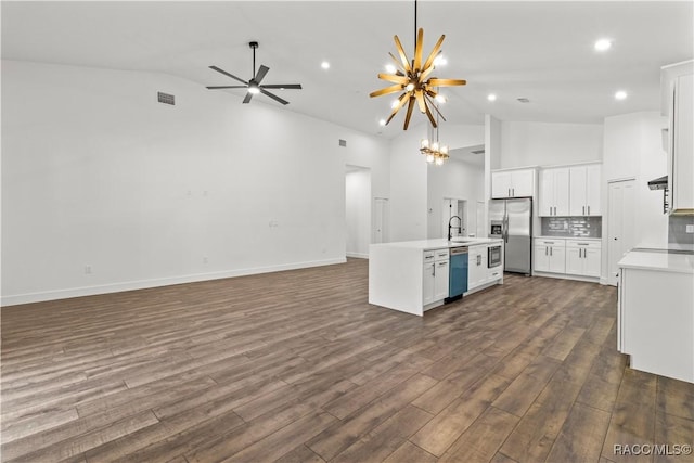 kitchen with white cabinets, dark hardwood / wood-style flooring, stainless steel appliances, and sink