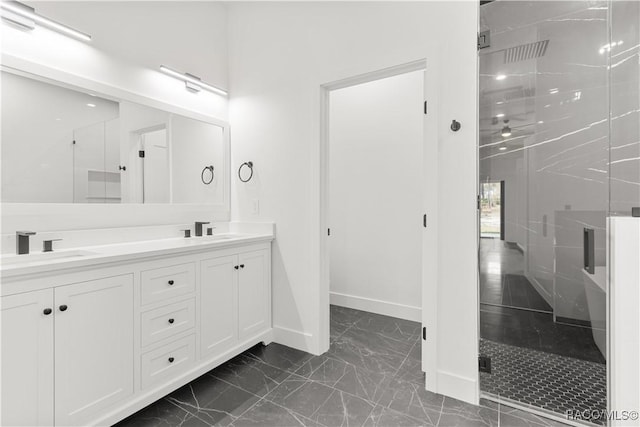 bathroom featuring vanity and an enclosed shower