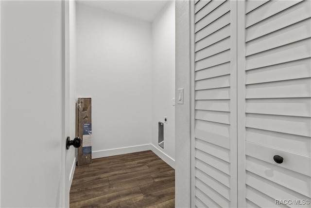 washroom featuring hookup for an electric dryer and dark hardwood / wood-style flooring