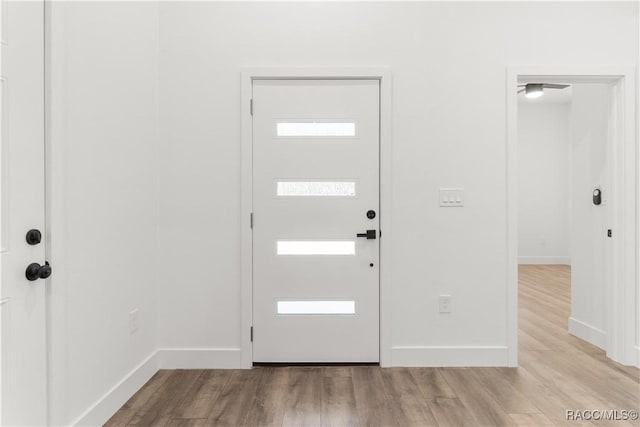 entrance foyer with light hardwood / wood-style floors