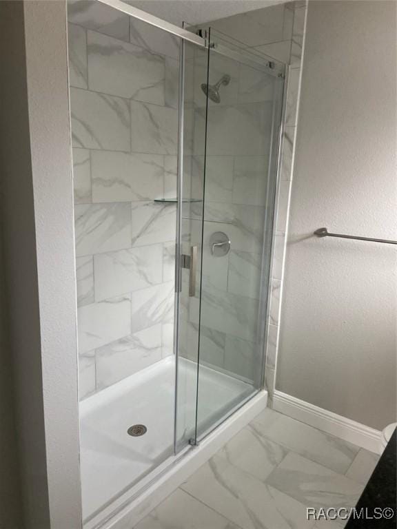 bathroom featuring walk in shower