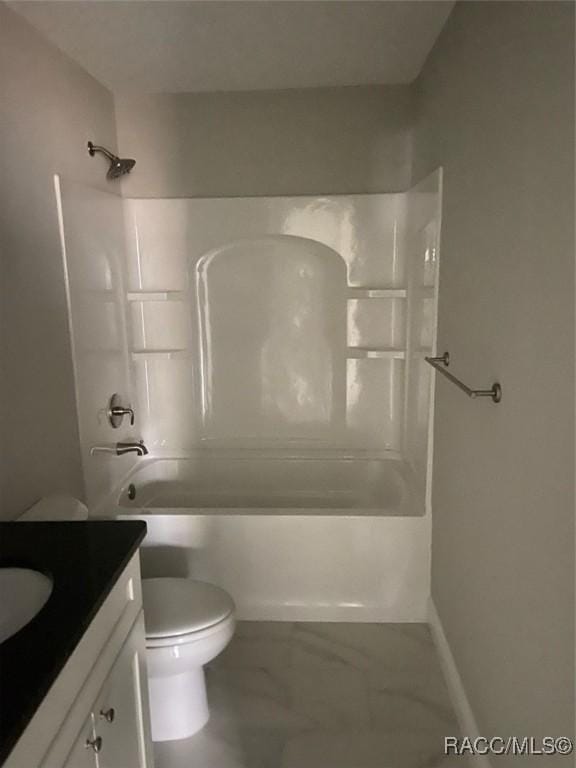 full bathroom featuring vanity, shower / bath combination, and toilet