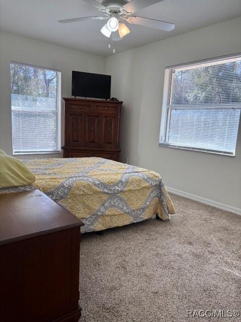 bedroom with carpet and ceiling fan