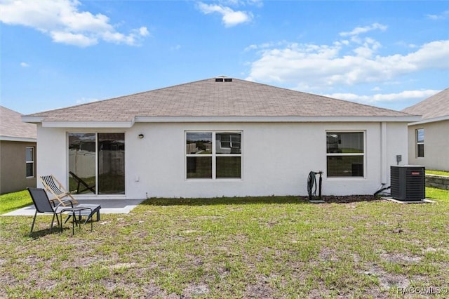 457 W Fairways View Dr, Beverly Hills, FL 34465 - back of house with central air condition unit, roof with shingles, stucco siding, and a yard