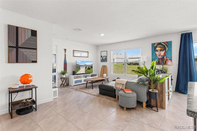 457 W Fairways View Dr, Beverly Hills, FL 34465 - living area featuring light tile patterned floors, recessed lighting, and baseboards