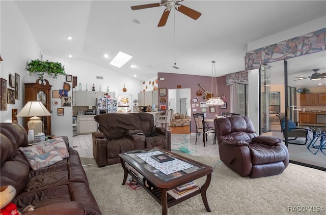 living area with recessed lighting, visible vents, light carpet, high vaulted ceiling, and ceiling fan with notable chandelier