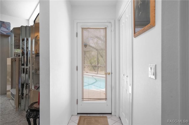 entryway with tile patterned floors