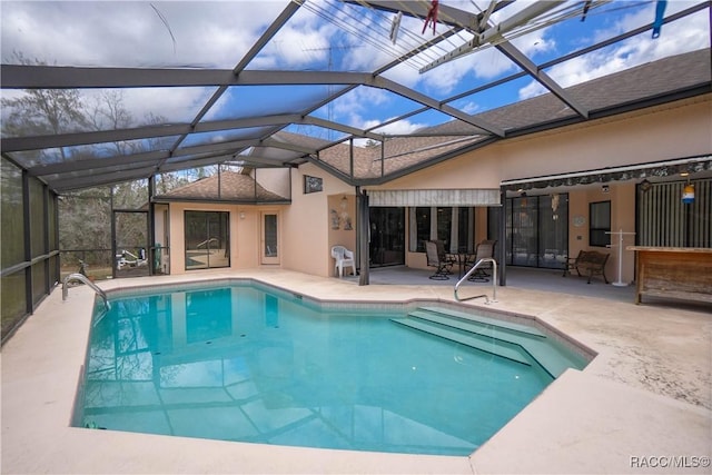 pool with a patio