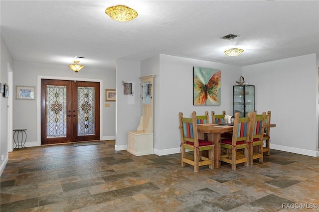 dining area featuring french doors