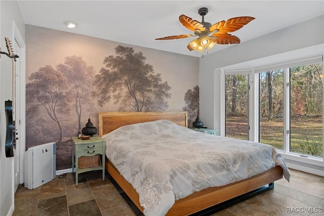 bedroom featuring ceiling fan