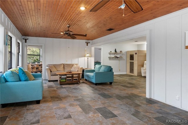 living room with wooden ceiling and ceiling fan