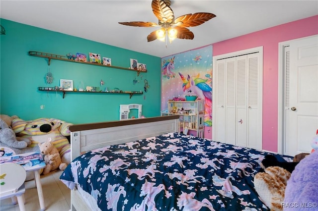 bedroom featuring hardwood / wood-style floors and ceiling fan