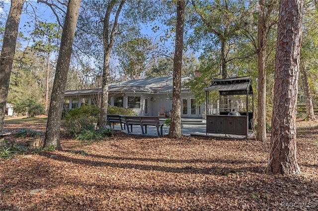 back of house featuring a patio area