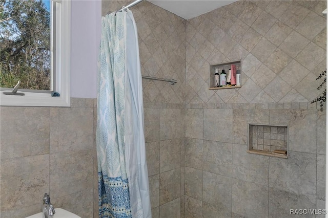 bathroom featuring a shower with curtain