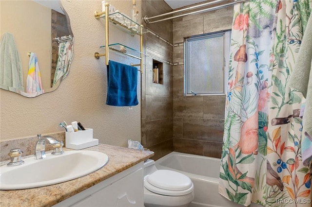 full bathroom with vanity, shower / tub combo with curtain, and toilet