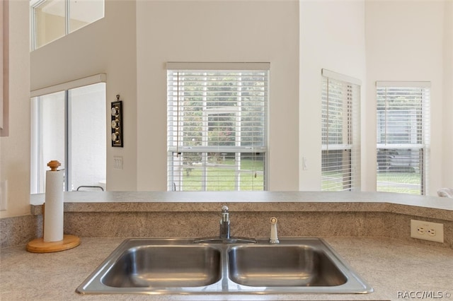 kitchen with plenty of natural light and sink