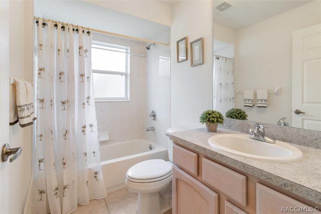 full bathroom with toilet, shower / bath combo, vanity, and tile patterned floors