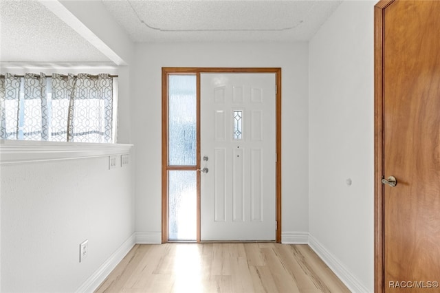 entrance foyer with light wood-type flooring