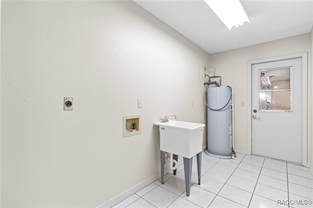 laundry area with electric water heater, light tile patterned floors, washer hookup, and hookup for an electric dryer