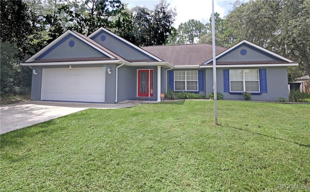 ranch-style house featuring a front yard and a garage