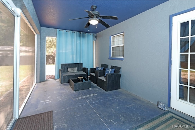 view of patio / terrace featuring ceiling fan and an outdoor hangout area