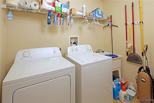 washroom featuring washer and clothes dryer