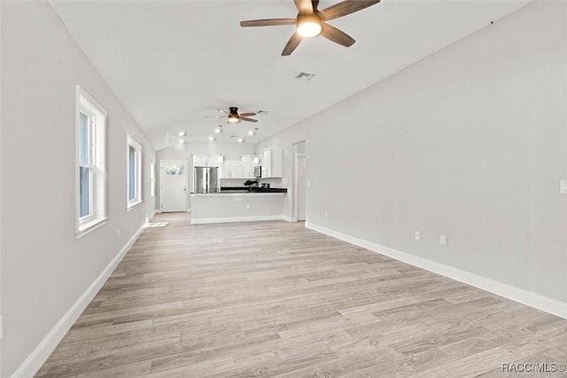 unfurnished living room with light hardwood / wood-style floors and ceiling fan