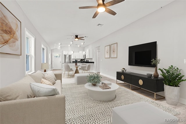 living room with ceiling fan