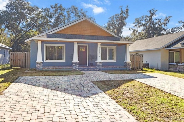 view of front of house featuring central AC and covered porch