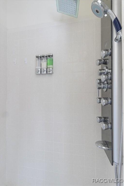 room details with a tile shower