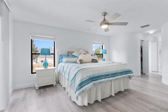 bedroom featuring ceiling fan and light wood-type flooring