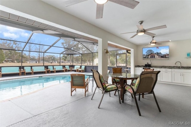 view of pool with sink