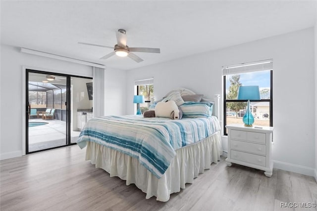 bedroom featuring access to outside, ceiling fan, and light wood-type flooring