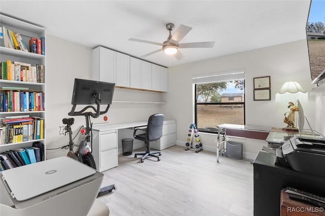 office area featuring ceiling fan and light hardwood / wood-style floors