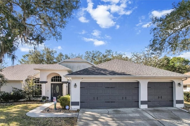 view of front of property featuring a garage