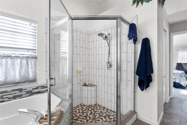 bathroom with independent shower and bath