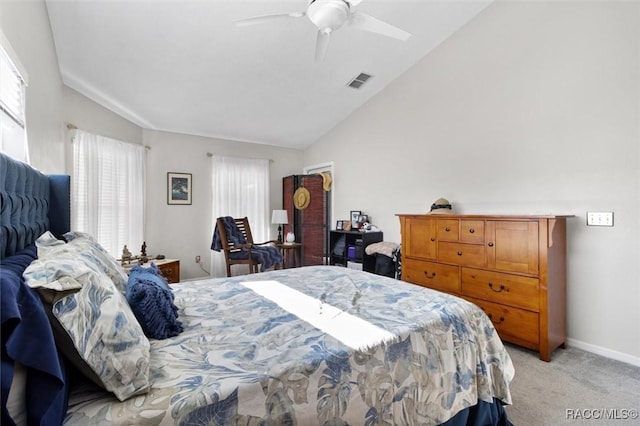 bedroom featuring lofted ceiling, light carpet, and ceiling fan