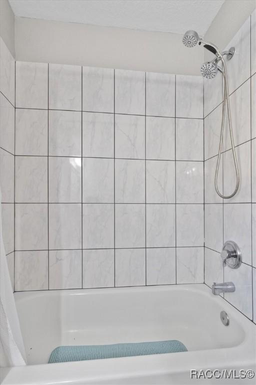 bathroom with a textured ceiling