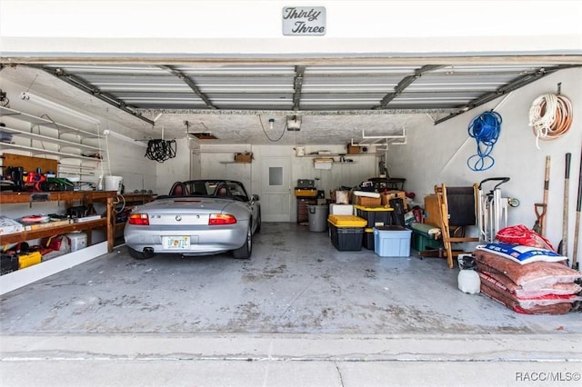 33 New York Blvd, Beverly Hills, FL 34465 - garage with a garage door opener