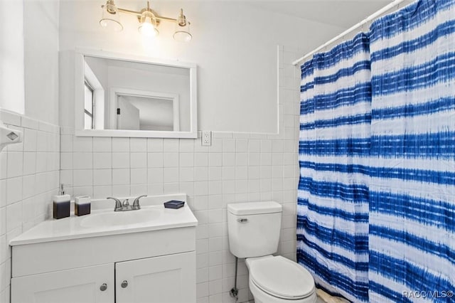 33 New York Blvd, Beverly Hills, FL 34465 - bathroom featuring tile walls, vanity, curtained shower, and a wainscoted wall