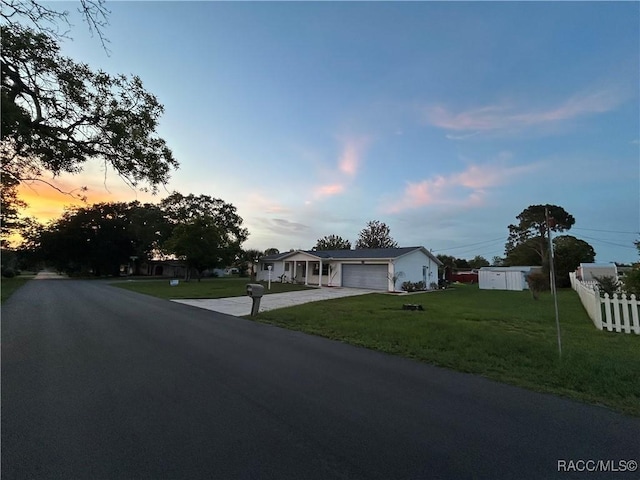 33 New York Blvd, Beverly Hills, FL 34465 - view of front of property featuring concrete driveway and an attached garage