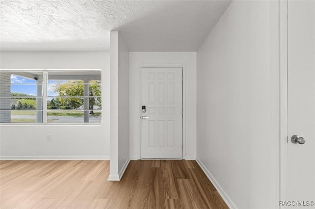 33 New York Blvd, Beverly Hills, FL 34465 - entrance foyer with wood finished floors and a textured ceiling
