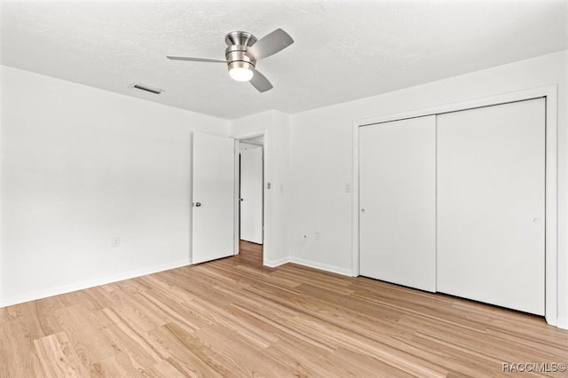 33 New York Blvd, Beverly Hills, FL 34465 - unfurnished bedroom featuring light wood-style floors, a closet, and a ceiling fan