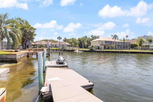 dock area with a water view