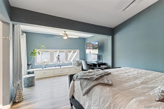 bedroom with ceiling fan and light hardwood / wood-style flooring