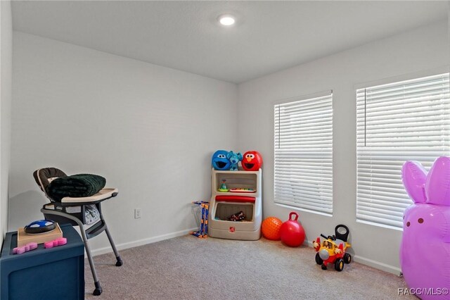 3192 W Barberton Pl, Citrus Springs, FL 34434 - game room with carpet floors and baseboards