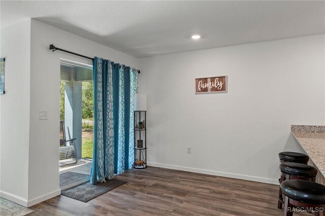 3192 W Barberton Pl, Citrus Springs, FL 34434 - interior space featuring wood finished floors and baseboards