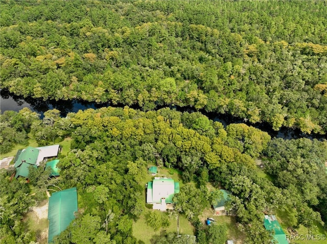 aerial view featuring a view of trees