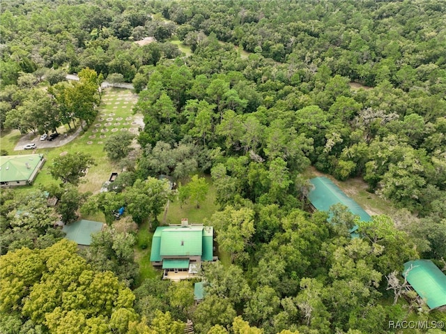 aerial view with a wooded view